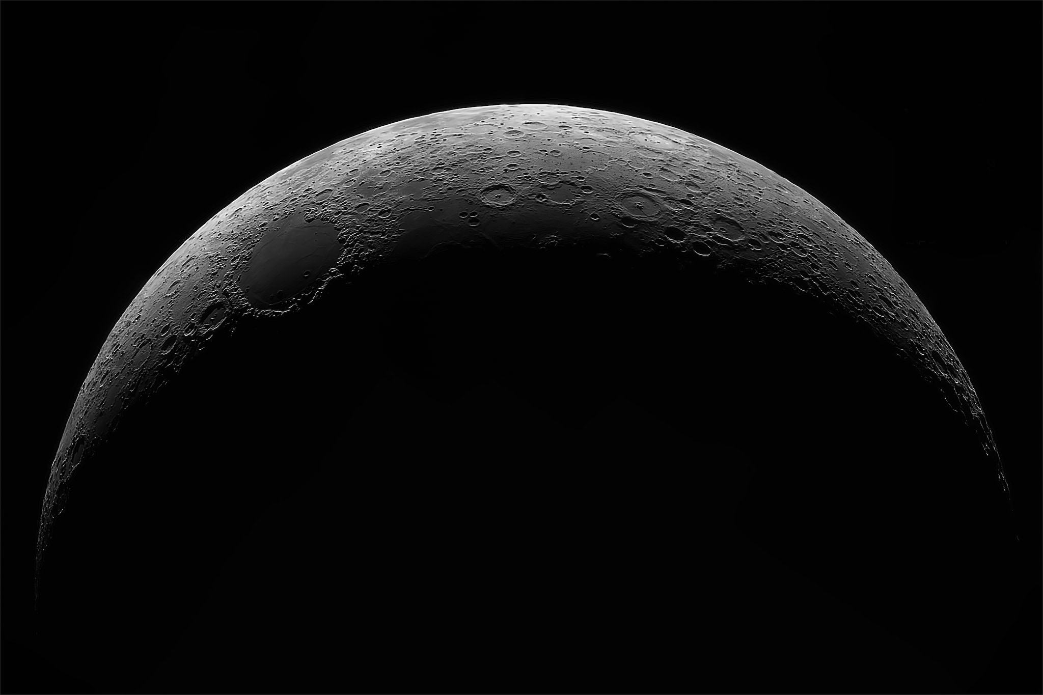 Crescent of a moon through a telescope. (Image: Shutterstock file)