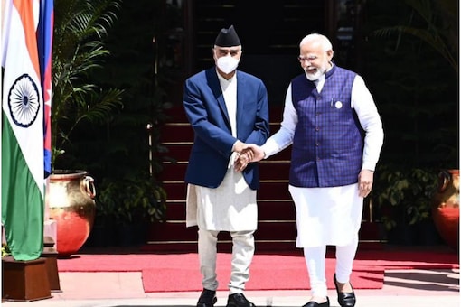 File Photo: Prime Minister Narendra Modi with his Nepal counterpart Sher Bahadur Deuba, in Delhi. (Image: Twitter/Narendra Modi)