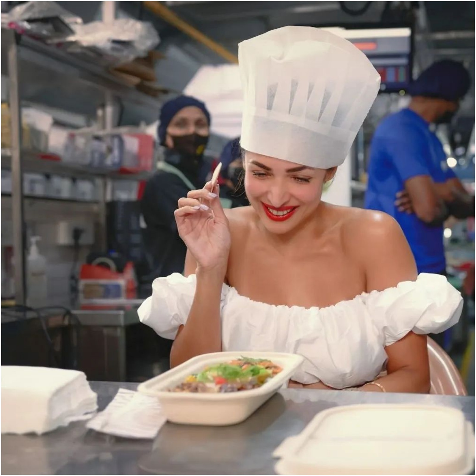 Malaika Arora seen donning the chef's hat while visiting her restaurant.