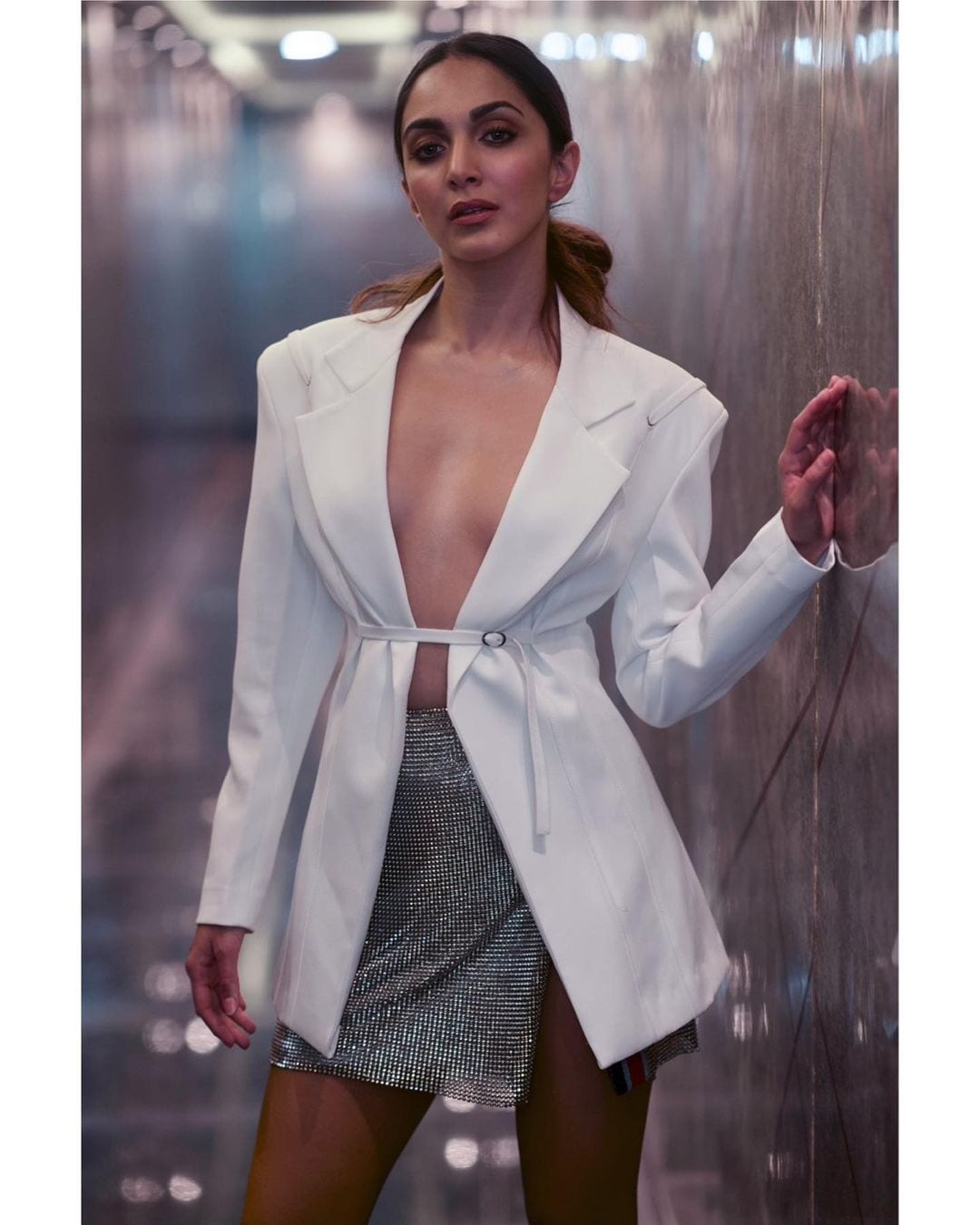 Kiara Advani looked chic and sexy in a Jacquemus white jacket paired with a Monisha Jaisingh mini skirt.