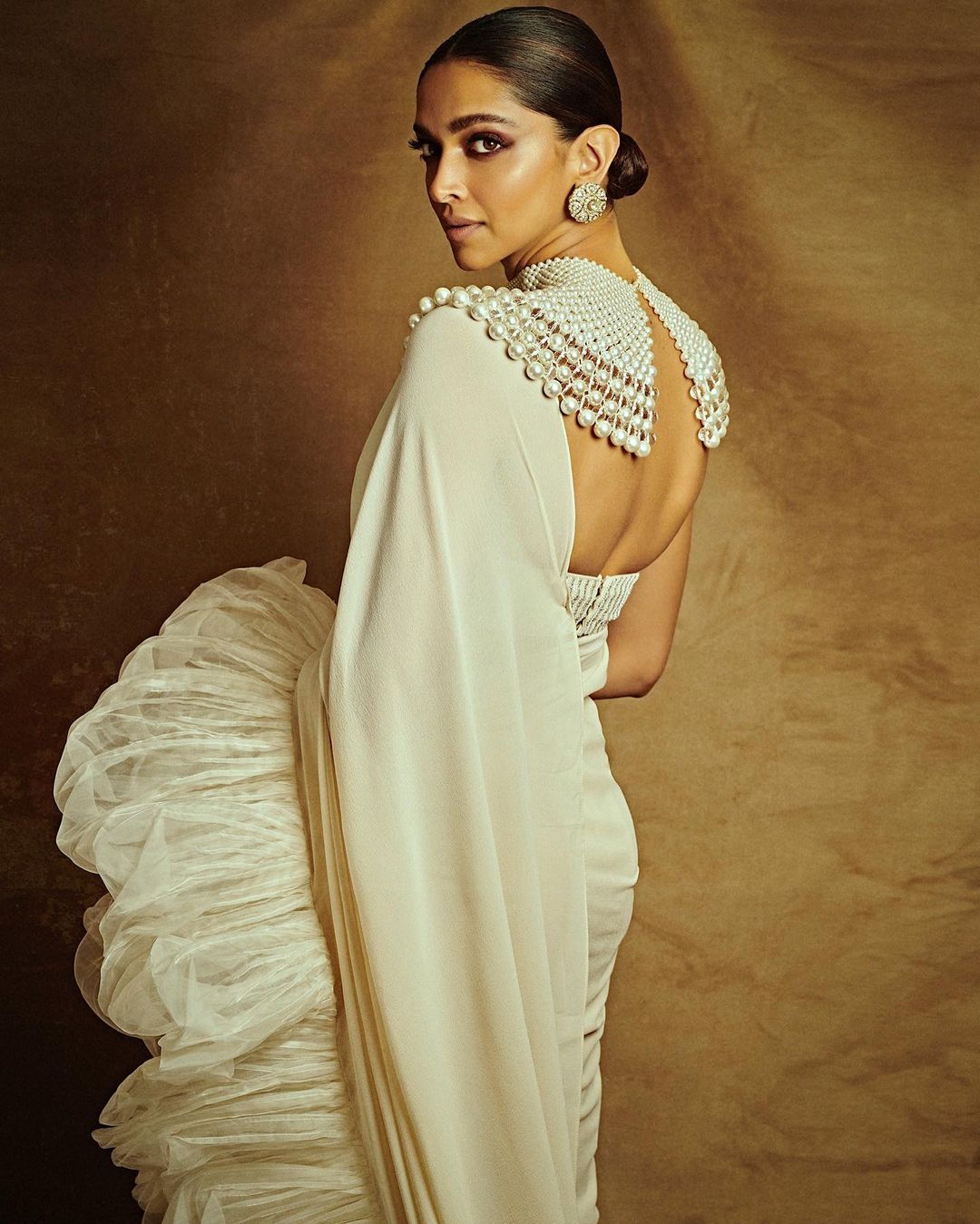 Dramatic pleated ruffles added flair to Deepika's overall look.