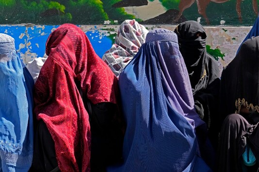 The Taliban claimed that women could provoke men and hence asked them to cover themselves fully with burka in a new diktat (Image: AP Photo) The Taliban claimed that women could provoke men and hence asked them to cover themselves fully with burka in a new diktat (Image: AP Photo)