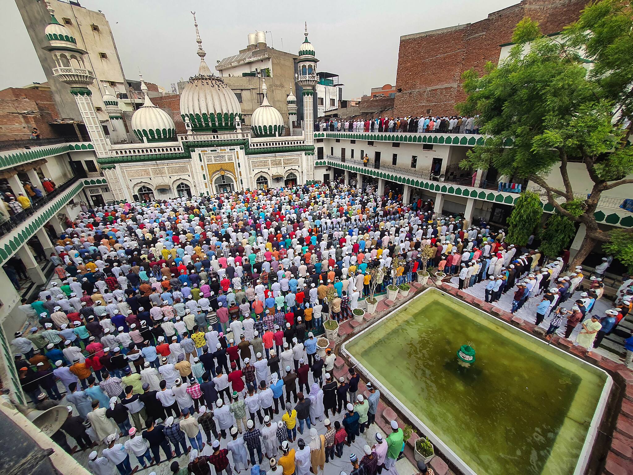 AMRITSAR: Muslims offer prayers at the Jama Masjid on the occasion of Eid-ul-Fitr, in Amritsar, on Tuesday. (PTI Photo) 