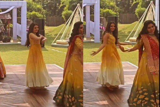 The bride, unable to control her excitement, can be seen dancing in the video alone as she accepts greetings from the guests on stage. (Credits: Instagram)