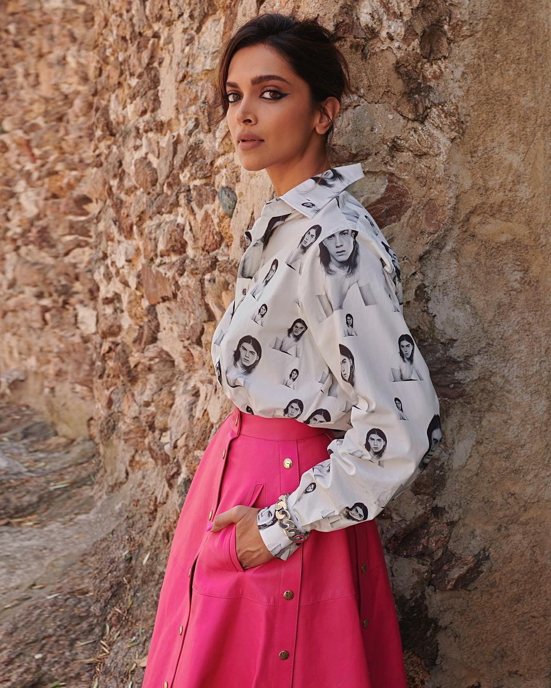 Deepika Padukone ups the hotness factor in a pink mini skirt and a black  turtleneck sweater from Louis Vuitton as she becomes Grazia's new cover  girl : Bollywood News - Bollywood Hungama