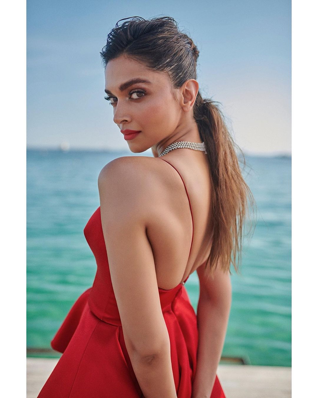 Deepika Padukone went for a messy hairdo and a Cartier necklace. 
