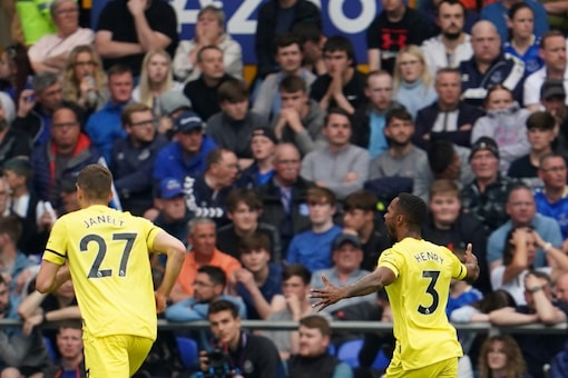 Brentford's Rico Henry, centre, celebrates after scoring his side's third goal during the Premier League match between Everton and Brentford at Goodison Park in Liverpool, England, Sunday, May 15, 2022. (AP Photo/Jon Super)