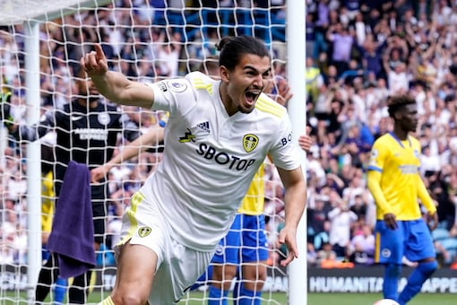 Leeds United's Pascal Struijk celebrates scoring their side's first goal of the game during the English Premier League match between Leeds United and Brighton and Hove, at Elland Road, Leeds, England, Sunday May 15, 2022. (Danny Lawson/PA via AP)