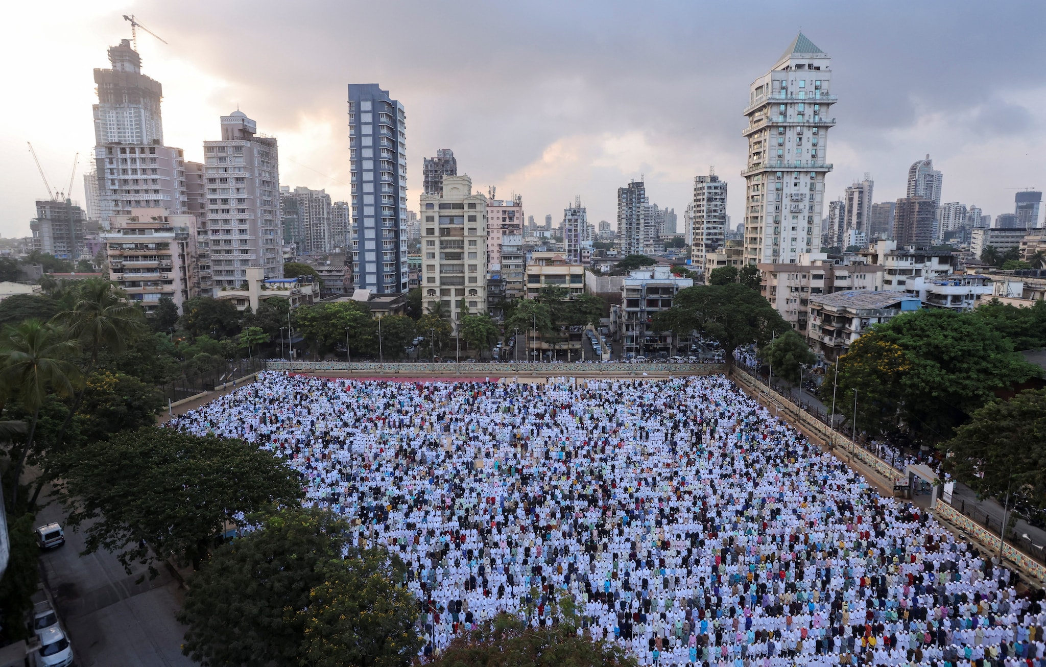 MUMBAI: Muslims offer Eid al-Fitr prayers at a football ground, in Mumbai, on Tuesday. (Image: Reuters)