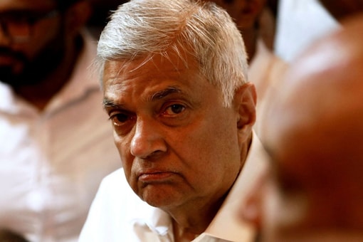 FILE PHOTO: Ranil Wickremesinghe, newly appointed prime minister, arrives at a Buddhist temple after his swearing-in ceremony amid the country's economic crisis, in Colombo, Sri Lanka, May 12, 2022. REUTERS/Dinuka Liyanawatte/File Photo
