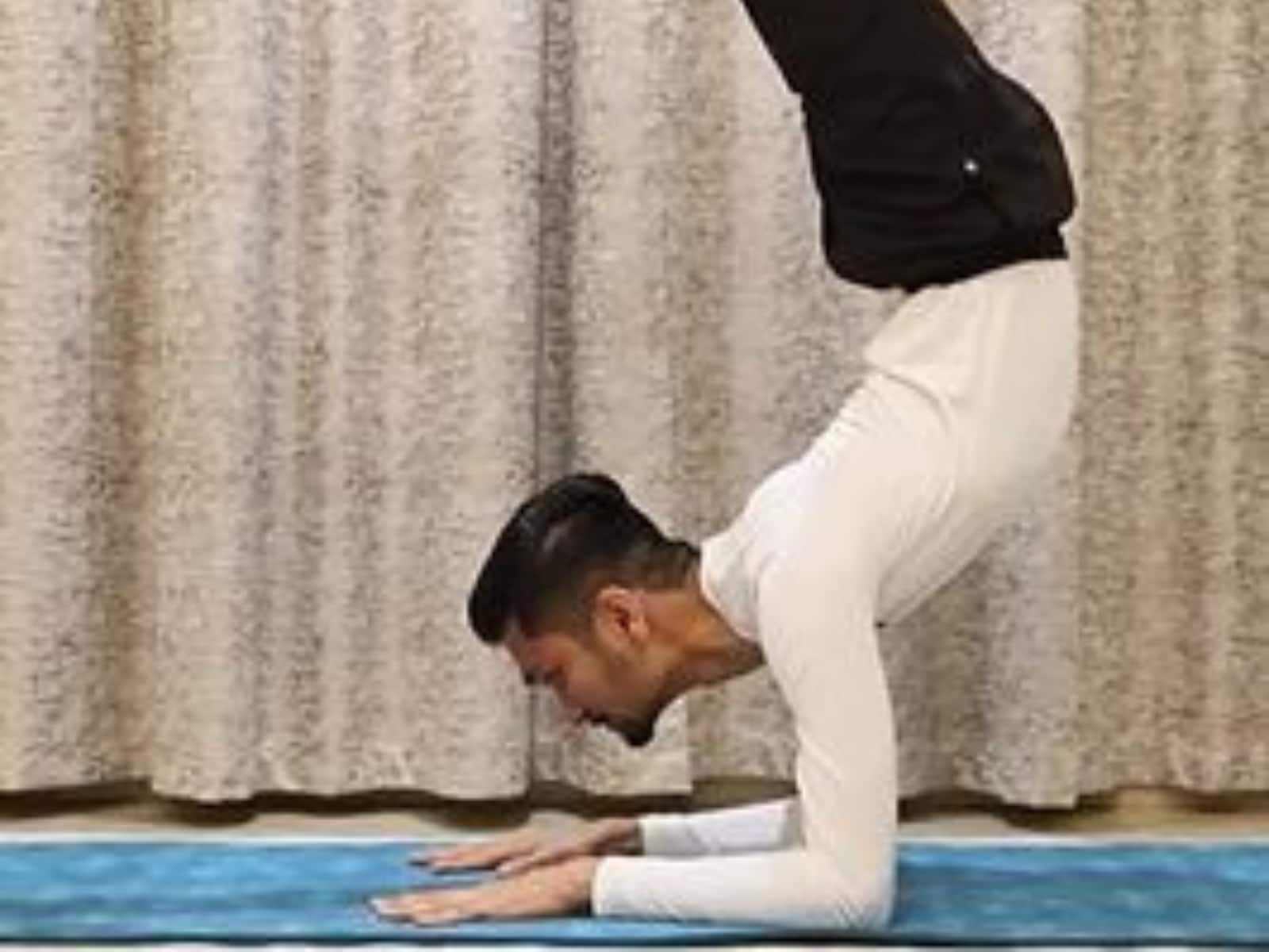 Vrschikasana (Scorpion Pose) | Iyengar yoga, Yoga for flexibility, Poses