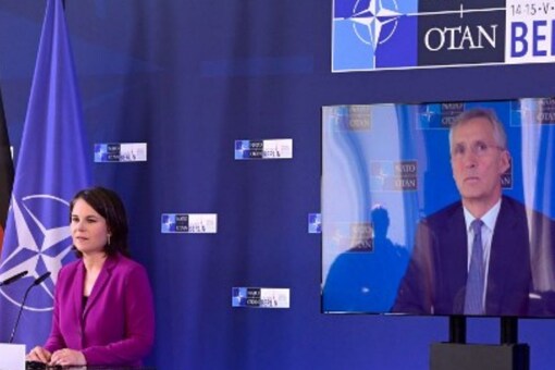 NATO secretary general Jens Stoltenberg at a press conference via videolink with German foreign minister Annalena Baerbock at the end of a NATO meeting over the conflict in Ukraine on Sunday. (Image: John MACDOUGALL/AFP)