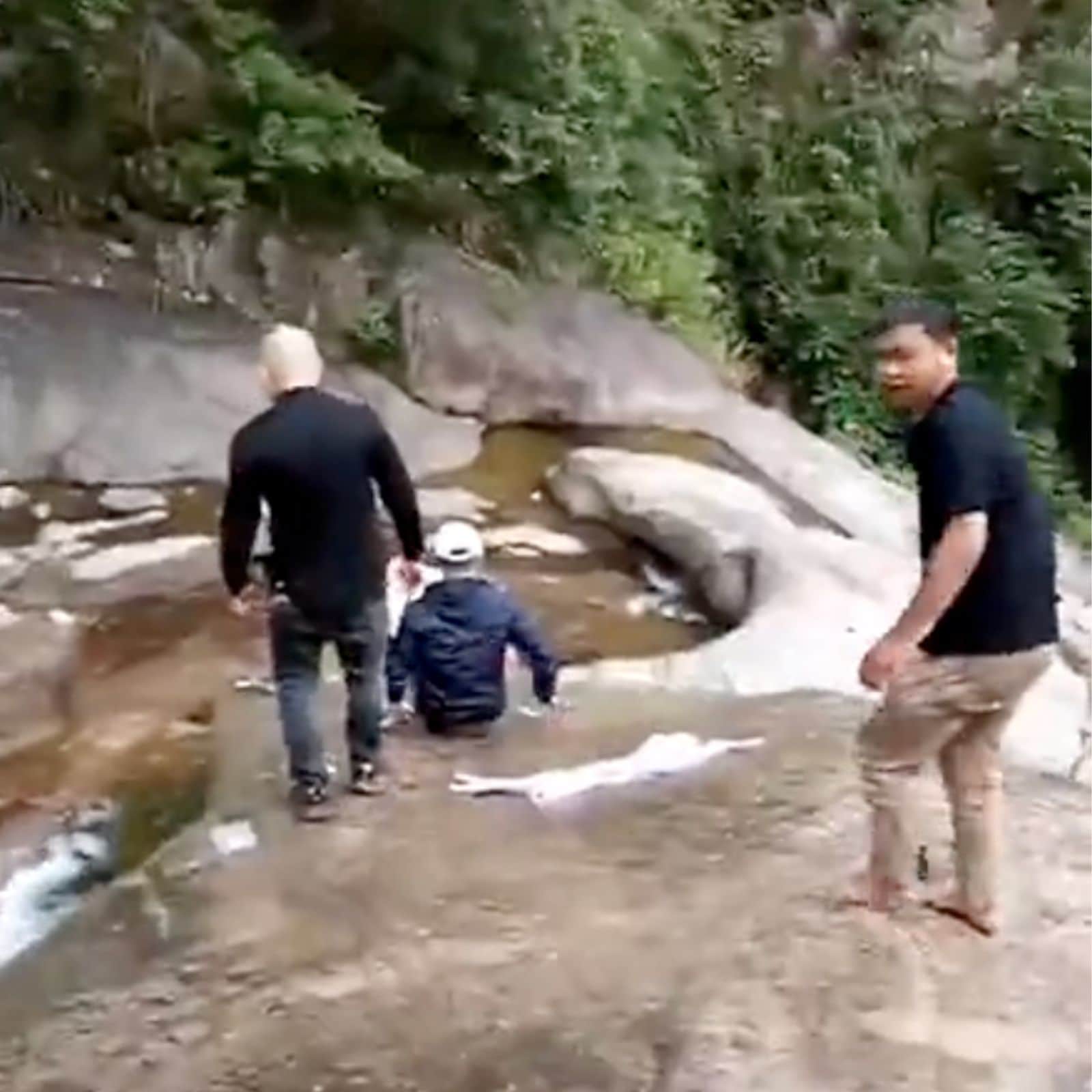 WATCH: Chinese Man Attempts to Cross Waterfall Despite Warning, Ends Up on  Bed of Rocks