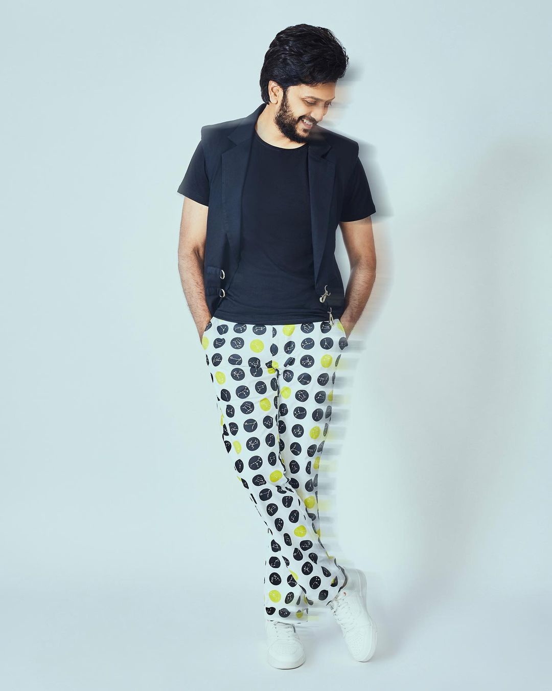 Riteish Deshmukh adds a pop of color to his ensemble designed by Crimsoun Club.