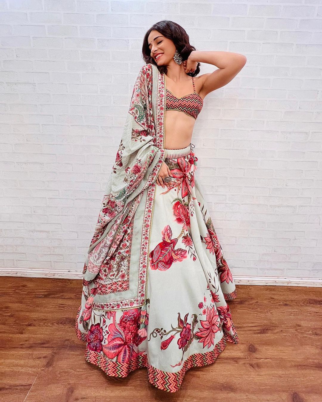 Ananya Panday is a vision to behold in a vibrant floral-printed lehenga.