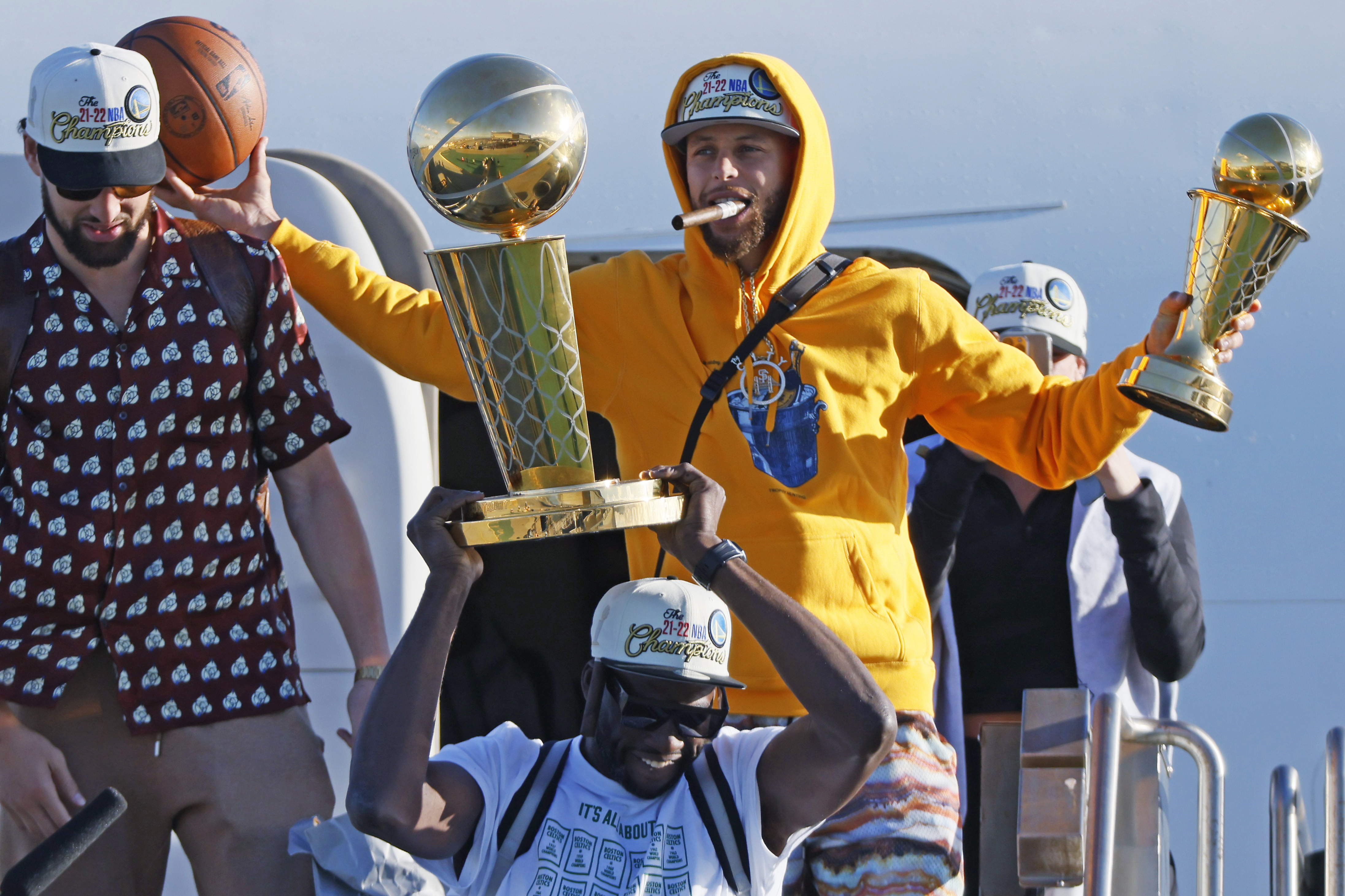 Draymond Green Klay Thompson & Stephen Curry Golden State Warriors Unsigned 2022 NBA Finals Celebration Photograph