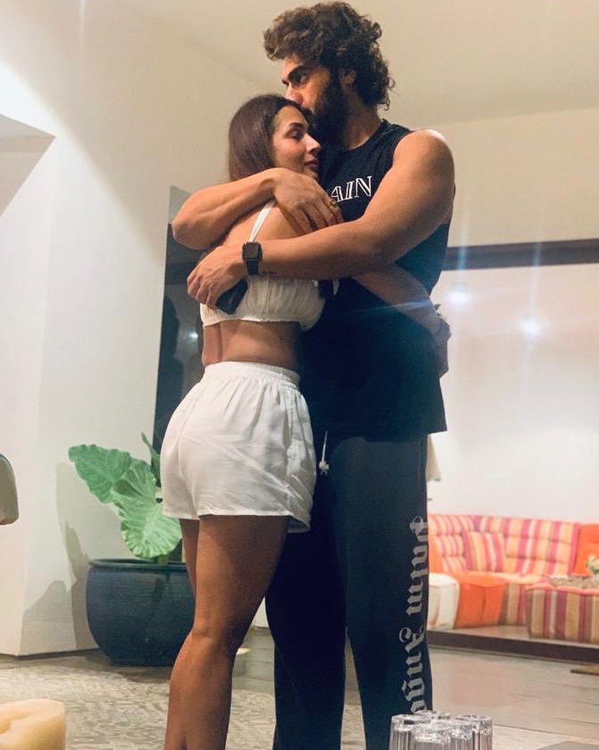 In this adorable picture, Arjun Kapoor can be seen giving his lady love Malaika a tight hug. (Image: Instagram)