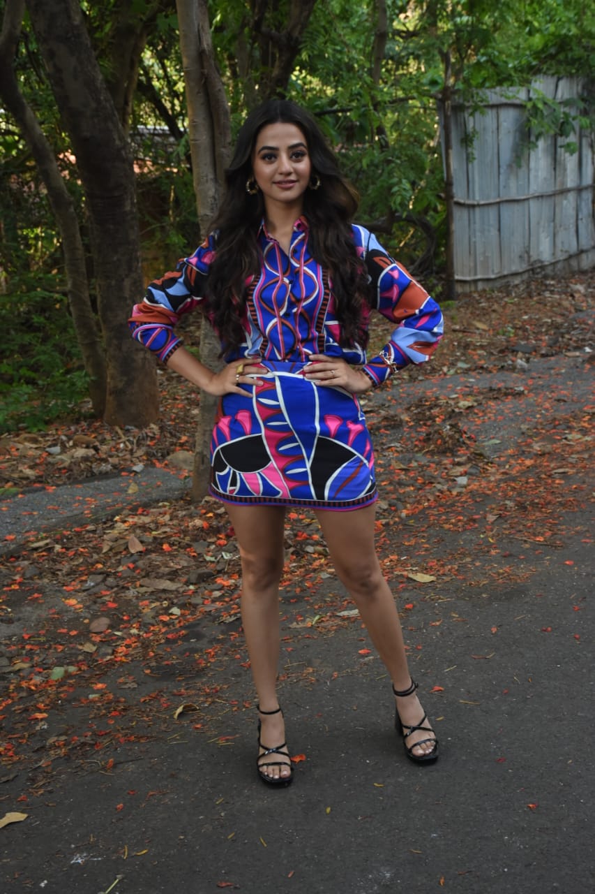 Helly Shah seen posing for paparazzi at a shoot. 