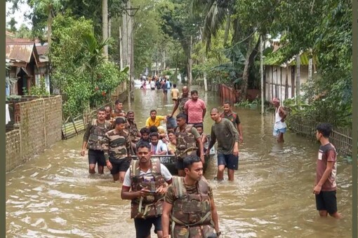 The devastating floods, caused by incessant rainfall, have affected 103 revenue circles and 4,536 villages. A total of 2,84,875 people have taken shelter in 759 relief camps across the state. The flood also damaged 173 roads and 20 bridges, while two embankments each were breached in Baksa and Darrang districts.

(File Photo: News18)