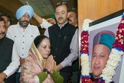 Himachal Pradesh Congress president Pratibha Singh pays tribute to former CM Virbhadra Singh on his birth anniversary, in Shimla, Thursday. (PTI Photo)
