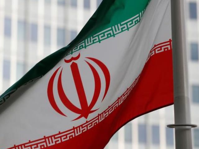 The Iranian flag flutters in front of the International Atomic Energy Agency (IAEA) headquarters in Vienna, Austria March 4, 2019. REUTERS/Leonhard Foeger/File Photo