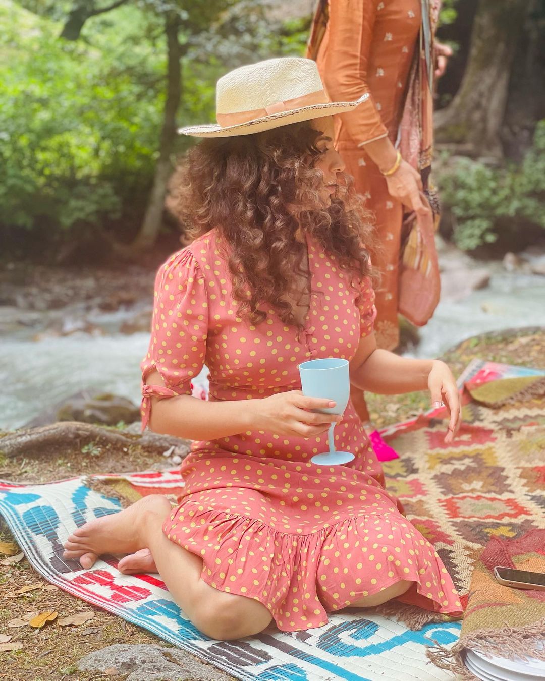Kangana Ranaut looks lovely in the polka-dot summer dress and straw hat.