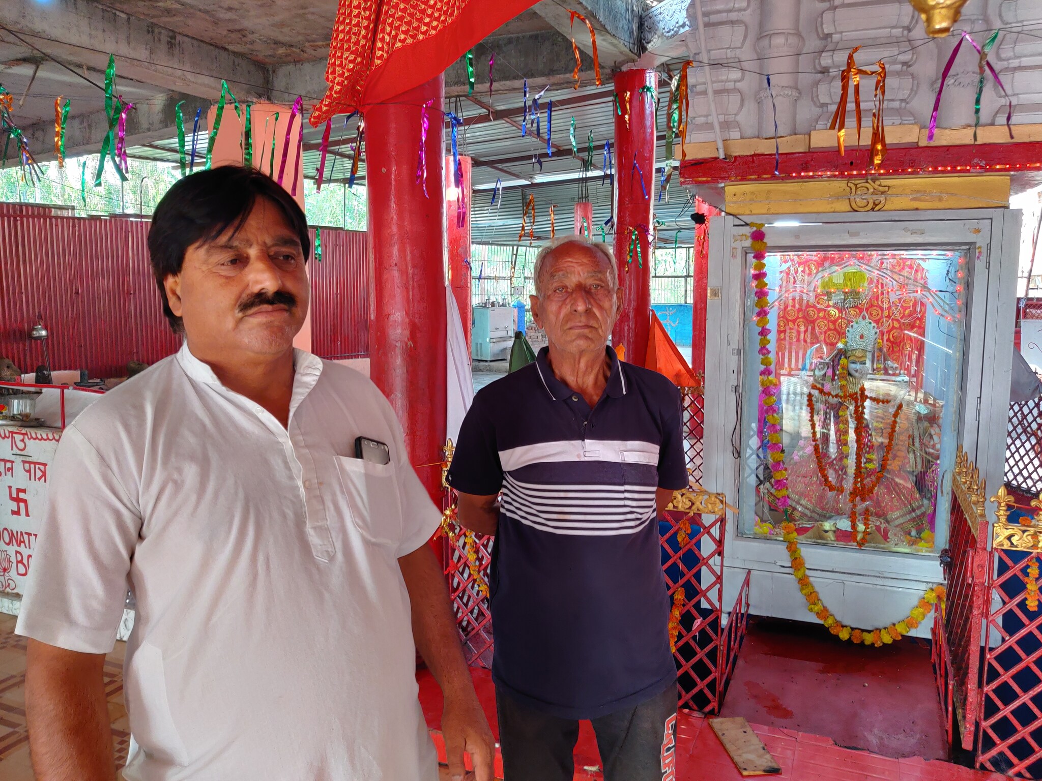 At the Kheer Bhawani temple in the Kashmiri Pandit colony in Jammu. Kakaji Bhan, trust president, in white kurta. Pic/News18