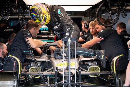 Mercedes driver Lewis Hamilton climbs into his car during the second practice session for the Canadian Grand Prix in Montreal, on June 17, 2022. (Paul Chiasson/The Canadian Press via AP)