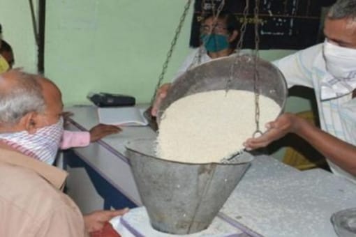 Food subsidy can be rationalised by replacing PDS with direct cash transfers. (File photo: PTI)