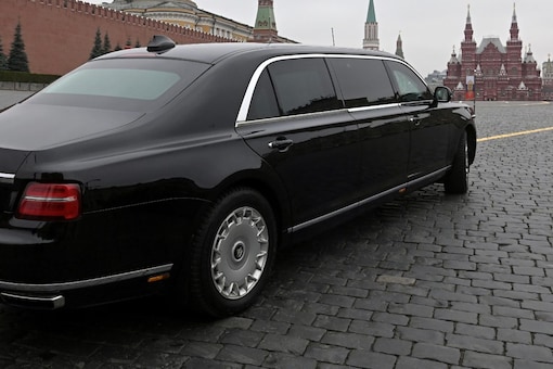Russian president Vladimir Putin's Aurus limousine is seen on Red Square in this file photo from 2019. His limousine was spotted rushing towards Kremlin on Saturday late night sparkign fears regarding his health (Image: Reuters File)