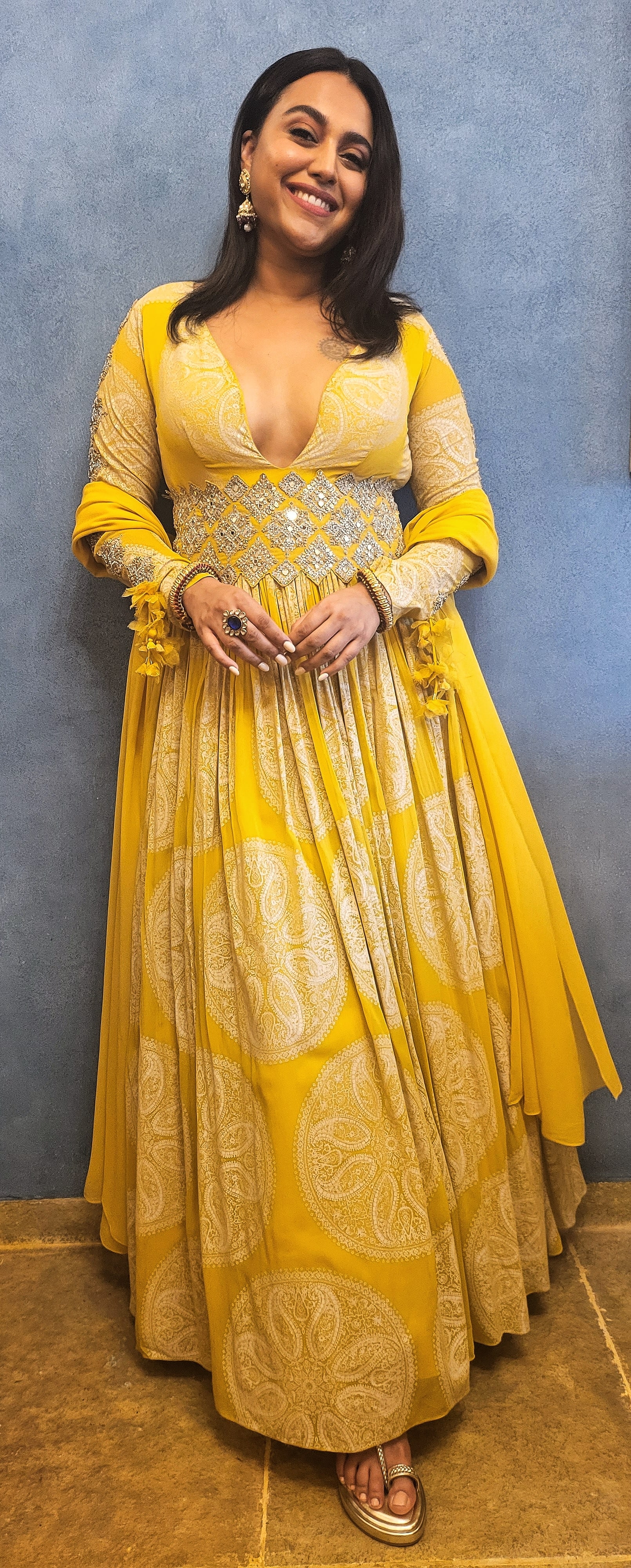 Swara Bhaskar dances in a desi style in a yellow anarkali set.