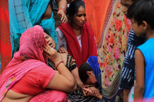 Family members mourn during the funeral procession of tailor Kanhaiya Lal in Udaipur, on June 29, 2022. (PTI)