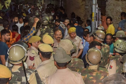 Police at the scene of crime after the murder of a tailor by two men, allegedly over his social media posts, in Udaipur, Tuesday evening, June 28, 2022. (Pic/PTI)  
