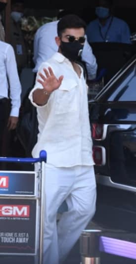 Virat Kohli looked summer ready will a white Shirt which he paired with white trousers