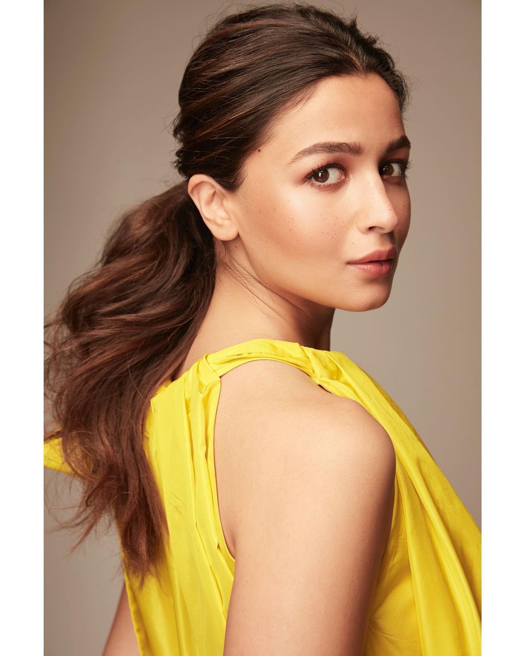 Alia Bhatt looks vibrant in the yellow balloon-style dress.
