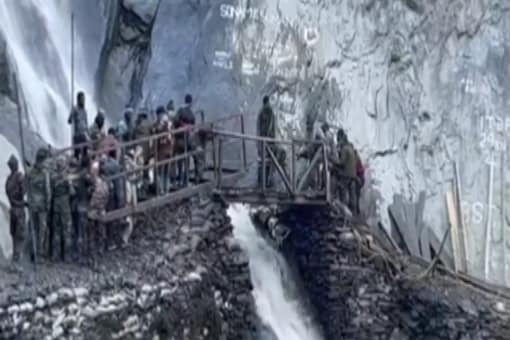 Army reconstructs bridge, damaged by landslide on Baltal route, overnight for Amarnath pilgrims. (Photo: Screen grab from video tweeted by ANI)