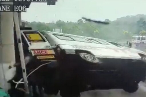 CCTV footage shows the ambulance swerving sideways towards the toll booth cabin and crashing. (Image: Twitter)