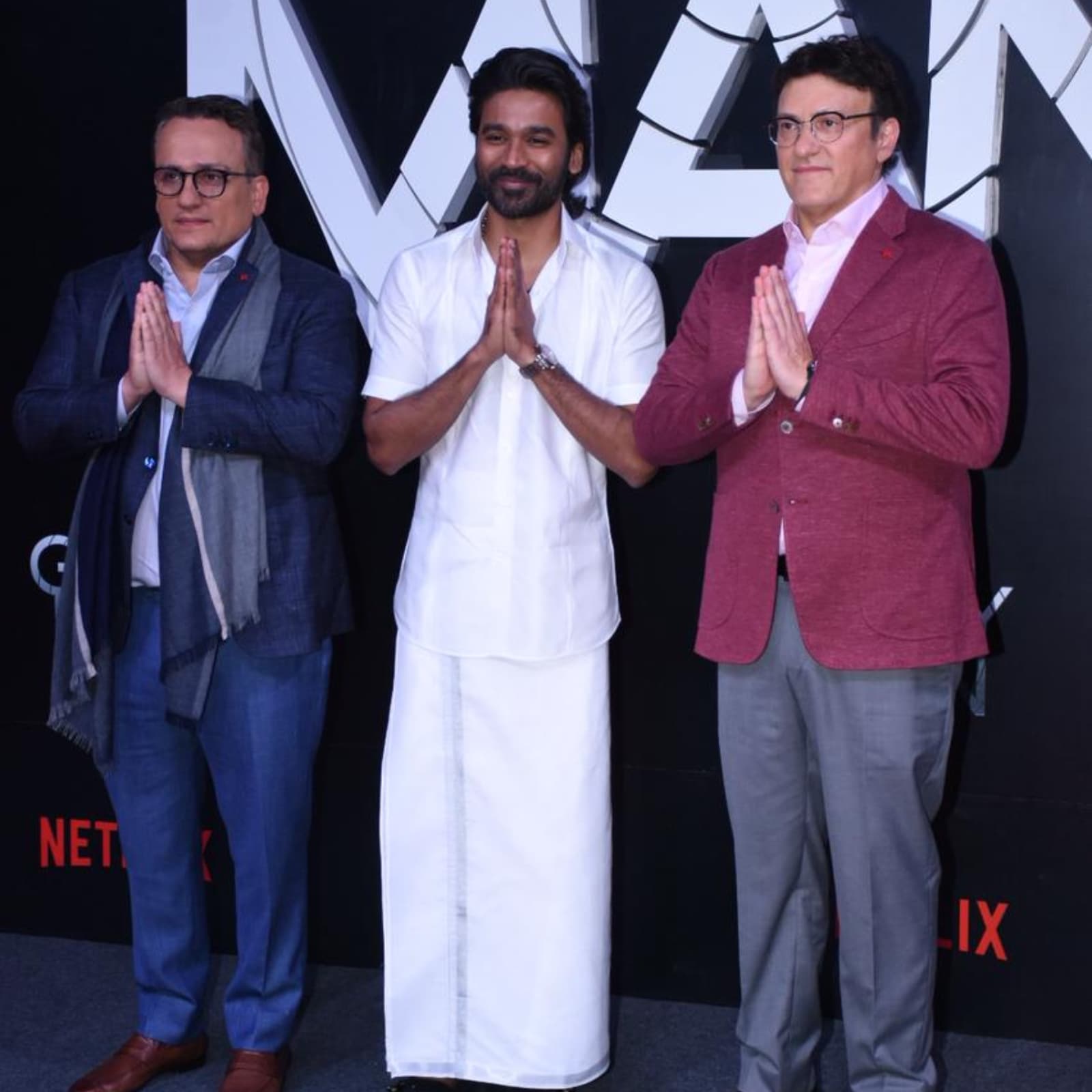 Dhanush Wears Veshti For 'The Gray Man' Mumbai Premiere, Poses