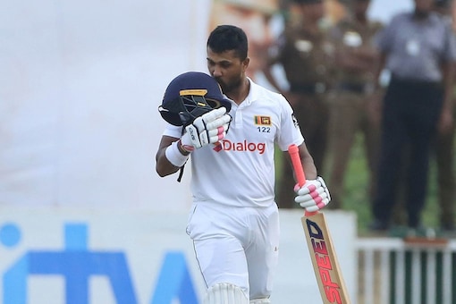 Sri Lanka's Dinesh Chandimal slammed his maiden double century and helped SL defeat Australia by an innings and 39 runs.