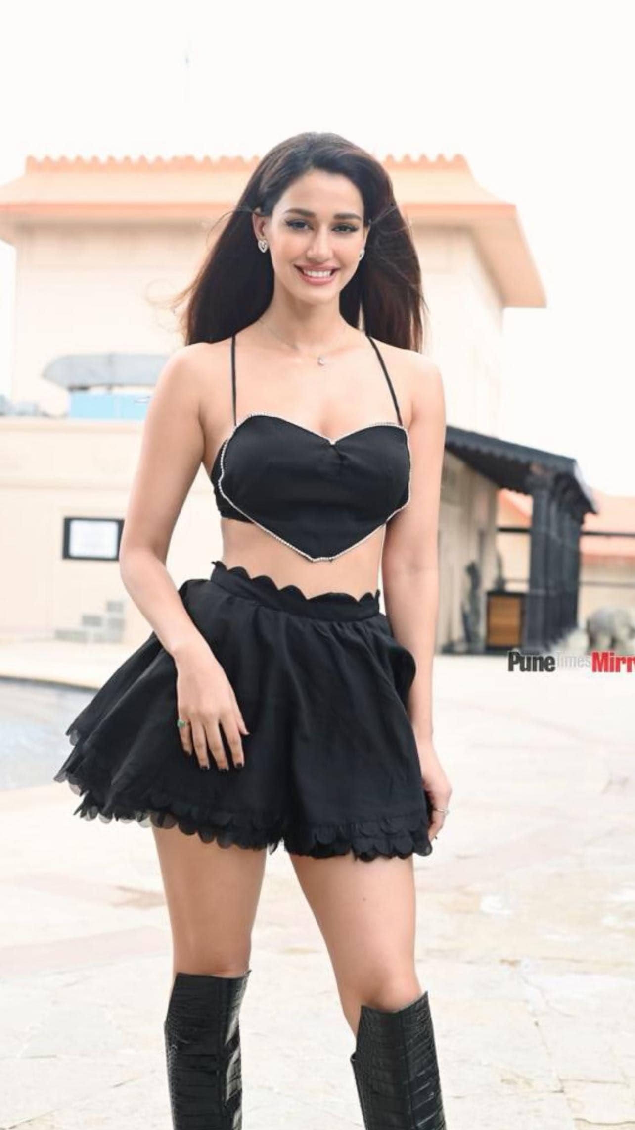 Disha Patani steps out in a black outfit. 