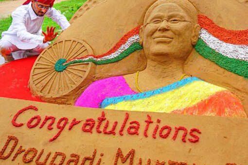 A sand sculpture of President-elect Droupadi Murmu made by artist Ajay Rawat, in Pushkar, on July 22, 2022. (PTI)