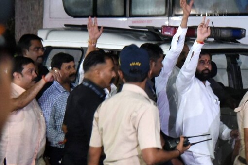 Maharashtra CM Eknath Shinde and rebel Shiv Sena MLAs leave from the airport, after arriving from Goa in Mumbai on July 2. (Image: PTI)