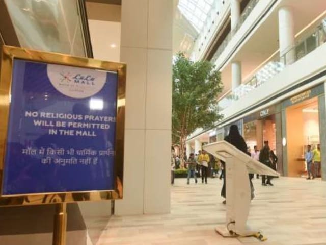 Notices regarding the ban of religious prayers put up inside the atrium of LuLu Mall, a day after controversy had broken out after a group of people allegedly offered namaz on the premises, in Lucknow. (File photo: PTI)