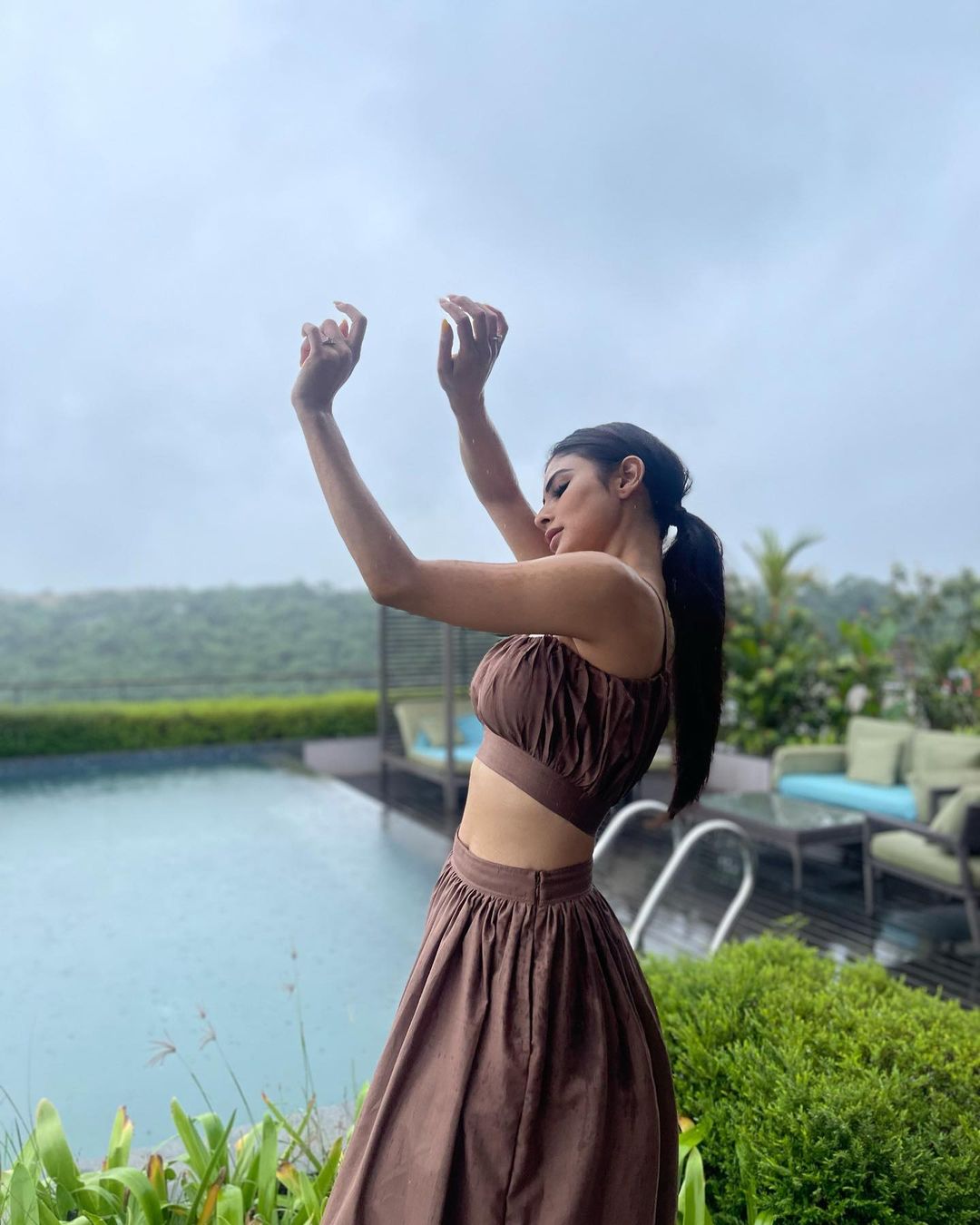 Mouni Roy flaunts her toned figure in the co-ord skirt set.