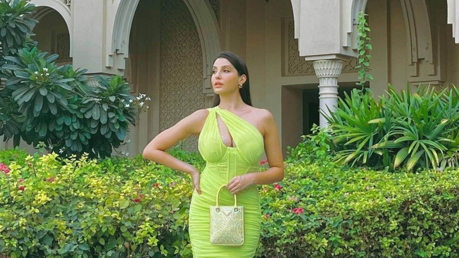 Nora Fatehi Flaunts Hourglass Figure In Neon Green Bodycon Dress Check