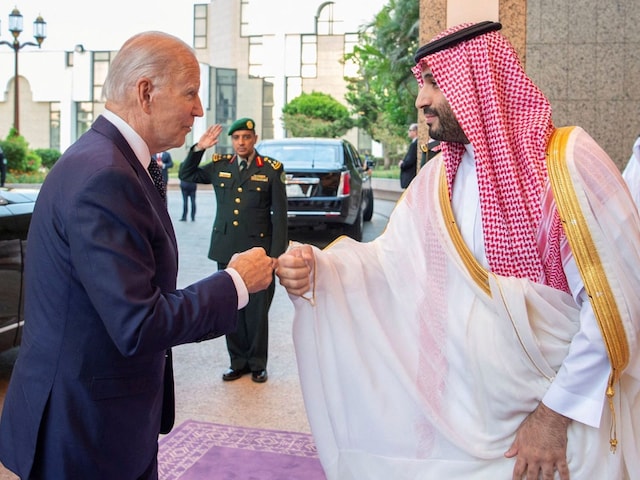 Saudi Crown Prince Mohammed bin Salman fist bumps US President Joe Biden on his arrival at Al Salman Palace, in Jeddah, Saudi Arabia, on Saturday. (Image: Bandar Algaloud/Courtesy of Saudi Royal Court/Handout via REUTERS)