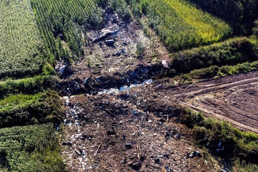 A view of the crash site of an Antonov An-12 cargo plane owned by a Ukrainian company, near Kavala, Greece, July 17, 2022. REUTERS/Alkis Konstantinidis