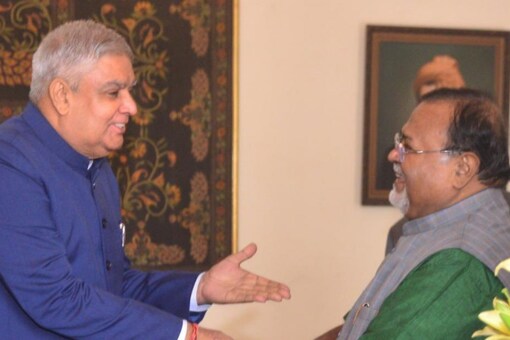 A file photo of Jagdeep Dhankar (left) with Partha Chatterjee. (Twitter)