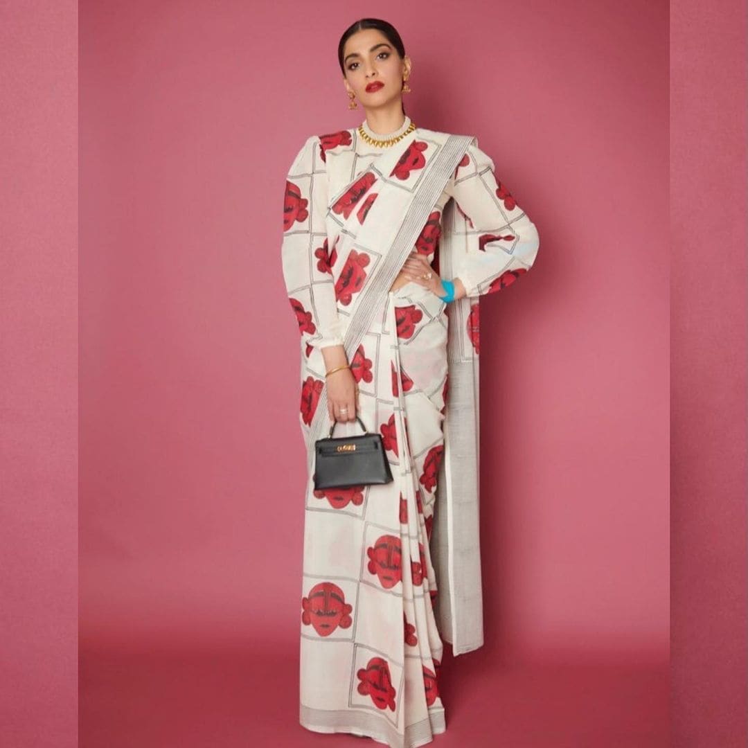 Sonam Kapoor Ahuja is wearing a handloom and hand block printed Big Ben Sari from The Invisible God designed by fashion designer Jebin Johny