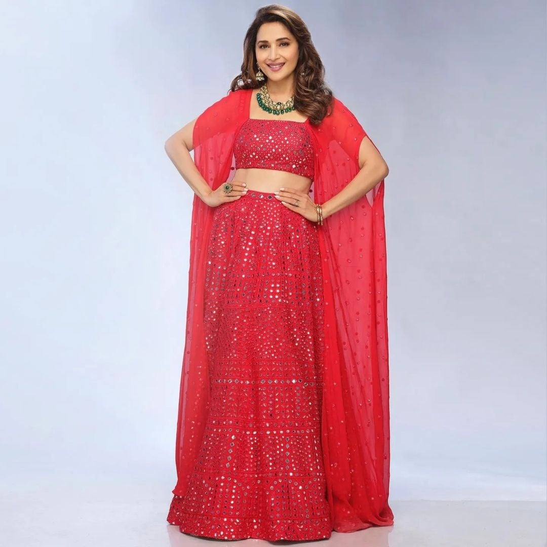 Madhuri Dixit Nene in an embroidered lehenga with mirror work by Tamanna Punjabi Kapoor